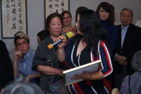 Tamiko Ooka accepts honor for Soh Daiko Taiko Group
